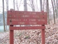 Trailhead sign by boat launch